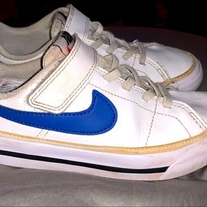 Kids Nike tennis shoes. Super cute, barely worn, no tie shoes.